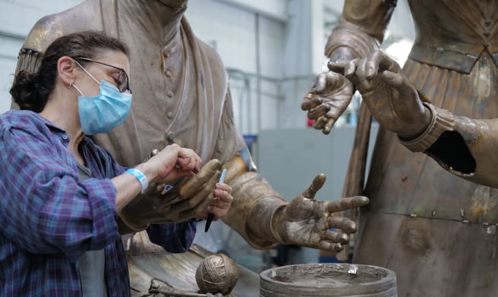 Meredith Bergmann works on the monument of women's rights pioneers ahead of its coming unveiling. Credit: Michael Bergmann