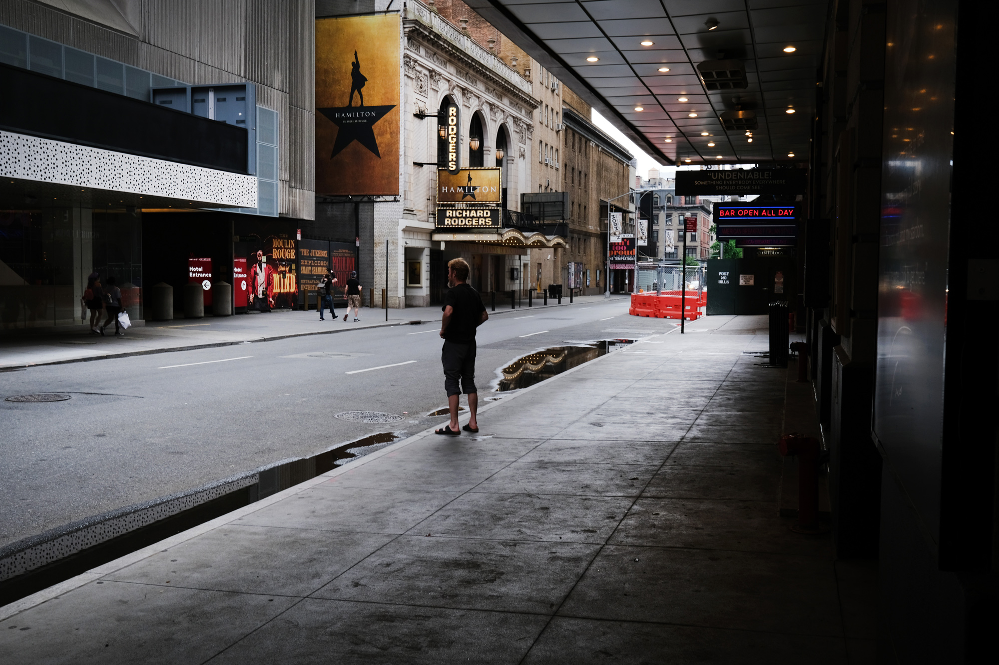 Broadway theaters stand closed along an empty street in the theater district on June 30 in New York City. Spencer Platt/Getty Images