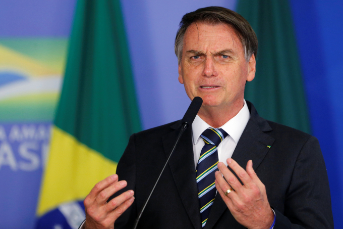 Tổng thống Brazil Bolsonaro bị người tiền nhiệm ví như "người tiền sử". Ảnh: Reuters.